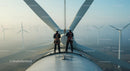 Engineers Conducting Maintenance on Large Wind Turbine