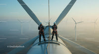 Technicians Maintaining Wind Turbine at Wind Farm