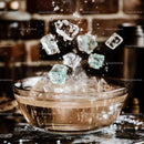 Dynamic Splash of Ice Cubes in Glass Bowl
