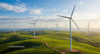 Scenic Wind Turbines on Rolling Green Hills at Sunset