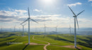 Wind Turbines on Rolling Green Hills under Blue Sky