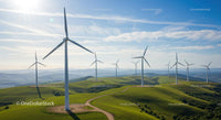 Wind Turbines on Green Hills Under Clear Blue Sky