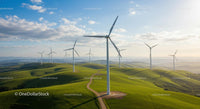 Wind Turbines on Green Rolling Hills Under Blue Sky