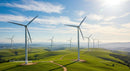 Wind Turbines on Green Hills Under a Blue Sky