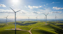 Wind Turbines on Rolling Green Hills Under Blue Skies