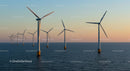 Offshore Wind Turbines at Sunset on Tranquil Ocean