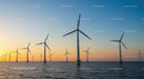 Offshore Wind Turbines at Sunset Over Tranquil Sea