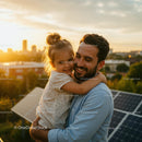 Smiling Father and Daughter Embracing on a Rooftop at Sunset