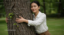 Woman Hugging Tree in Peaceful Green Park