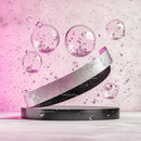Floating Glass Bubbles with Pink Glitter on Silver Background