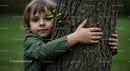 Child Hugging Tree in Peaceful Green Environment