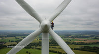 Wind Turbine Maintenance with Scenic Landscape View