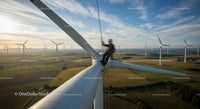 Aerial View of Maintenance on Wind Turbine in Green Fields