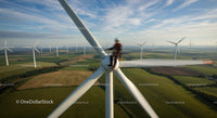 Technician Performing Maintenance on Wind Turbine