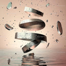 Floating Metallic Rings Over Water with Reflections