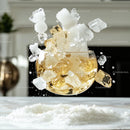 Refreshing Splash of Ice Cubes with Golden Beverage