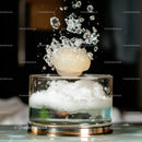 Exploding Ice with Spherical Frozen Delight in Glass