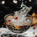 Dramatic Splash in Glass Bowl with Ice and Red Gems