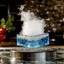 Blue Ice Cube Splashing Dramatically in Mid-Air