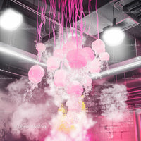 Vibrant Pink Jellyfish Art Installation in Modern Interior