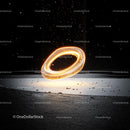 Glowing Ring with Mystical Aura on Dark Background
