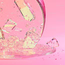 Glittering Ice Cubes on Vibrant Pink Background