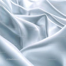 Elegant Flowing White Silk Fabric with Soft Folds