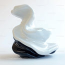 Elegant Abstract Sculpture with Fluid Black and White Design