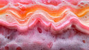 Vibrant Pink and Orange Abstract Foam Texture