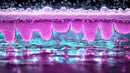 Macro View of Vibrant Purple and Pink Liquid Droplets