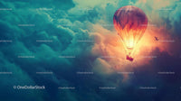 Hot Air Balloon Soaring Through a Dramatic Sunset Sky