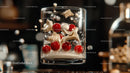 Festive Cocktail with Colorful Spheres in Glass