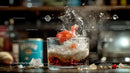 Cherry Splashing into a Refreshing Beverage Glass