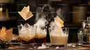 Sophisticated Cocktails with Smoky Touch and Citrus Garnish