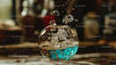 Floating Blue Liquid Sphere with Bubbles