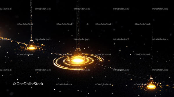 Golden Droplets Creating Ripple Effects on Dark Background
