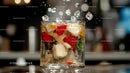 Refreshing Sparkling Beverage with Ice Cubes and Fruit