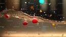 Dynamic Splash with Red Beads and Floating Particles