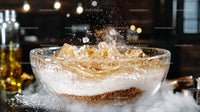 Fizzy Drink Splashing with Ice Cubes in Glass Bowl