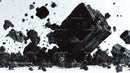 Dramatic Explosion of Black Mineral Fragments