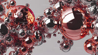 Reflective Metallic Spheres with Red and Silver Bubbles