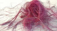 Abstract Tangle of Pink Fibers Creating Intricate Patterns
