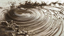 Dynamic Swirl of Rich Chocolate Liquid Texture