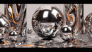 Abstract Reflective Metallic Spheres on Fluid Surface