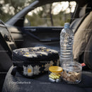 Travel Essentials with Snacks and First Aid Kit in Car