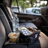 Travel Essentials with Snacks and First Aid Kit in Car