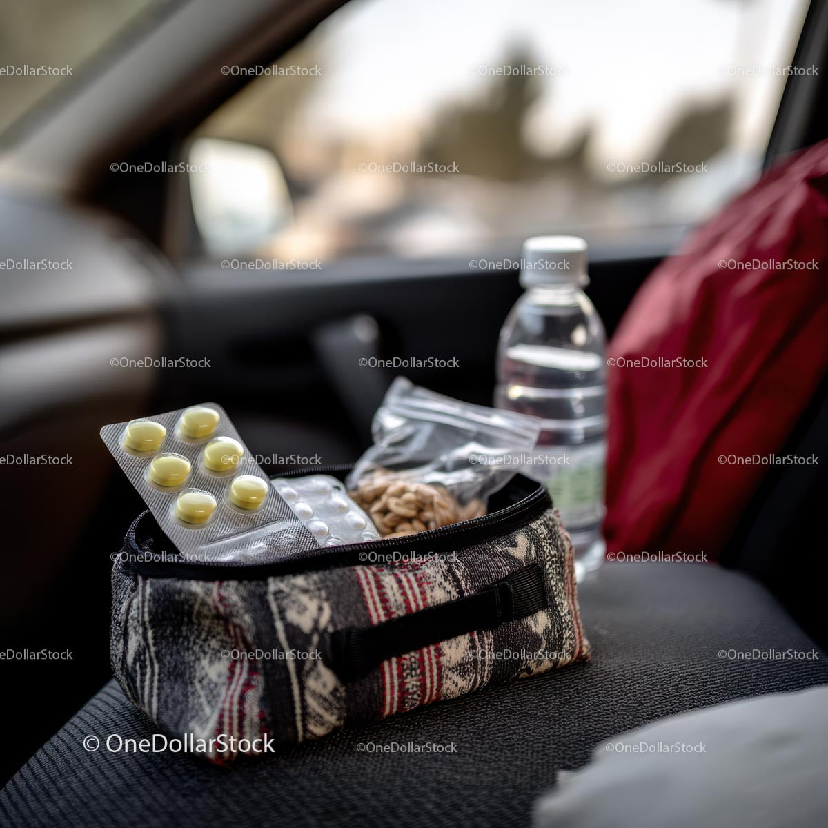 Travel Essentials with Snacks and First Aid Kit in Car