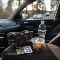 Travel Essentials with Snacks and First Aid Kit in Car