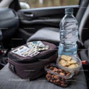Travel Essentials with Snacks and First Aid Kit in Car