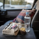 Travel Essentials with Snacks and First Aid Kit in Car